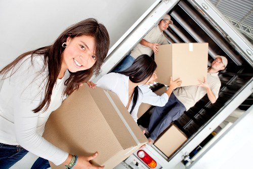 Packed boxes and furniture ready for Haroldwood relocation
