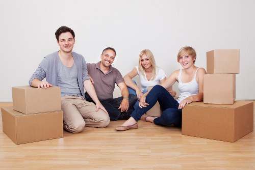 Packed moving boxes and furniture for Haroldwood removals